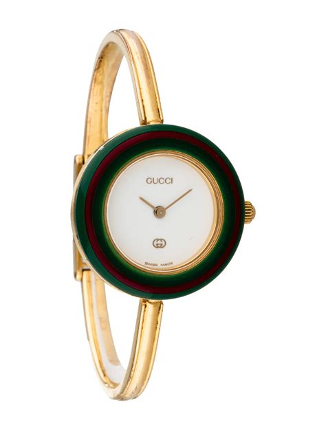 gucci watch with bezels.